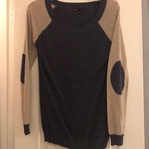 Blue block colored sweater with elbow patches